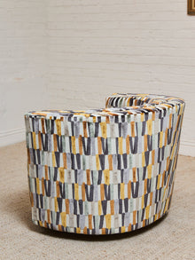 Babita Swivel Chair in Striker Copper