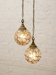 Pair of Vintage Faceted Glass Globe Pendant Lights with Ornate Brass Caps