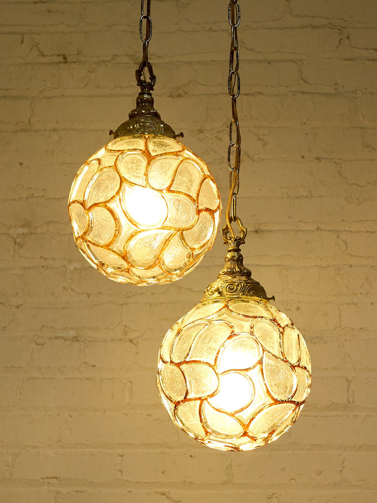 Pair of Vintage Faceted Glass Globe Pendant Lights with Ornate Brass Caps