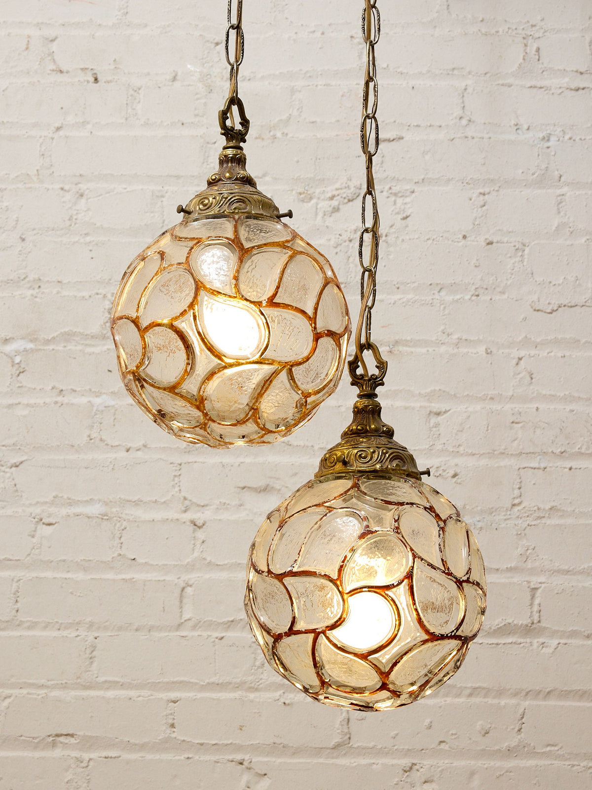 Pair of Vintage Faceted Glass Globe Pendant Lights with Ornate Brass Caps