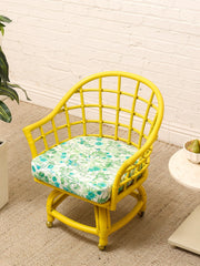 Set of Four Vintage Bright Yellow Rattan Barrel Chairs with Floral Cushions